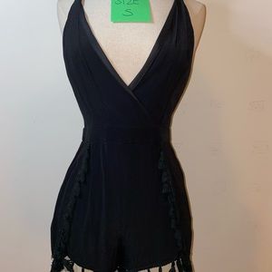 Black short jumper. Size small. Never worn.